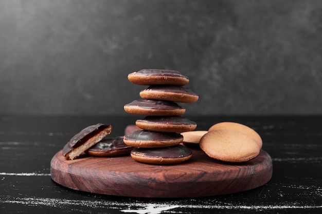 Chocolate sponge cookies on a wooden board