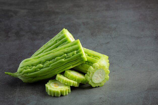 chopped bitter gourd put on dark floor