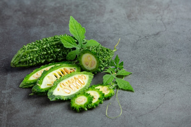 chopped bitter gourd put on dark floor