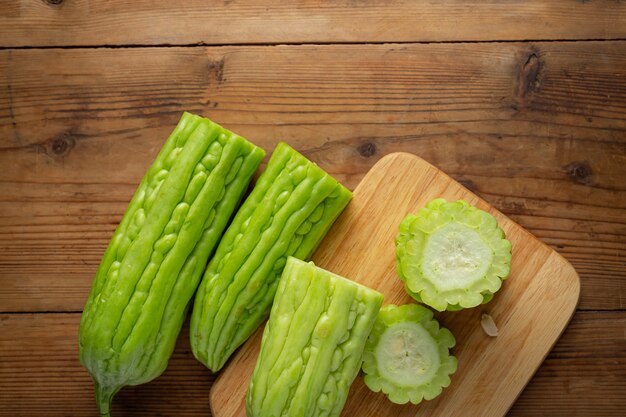 Chopped bitter gourd put on wooden cutting board