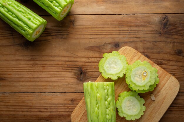 chopped bitter gourd put on wooden cutting board