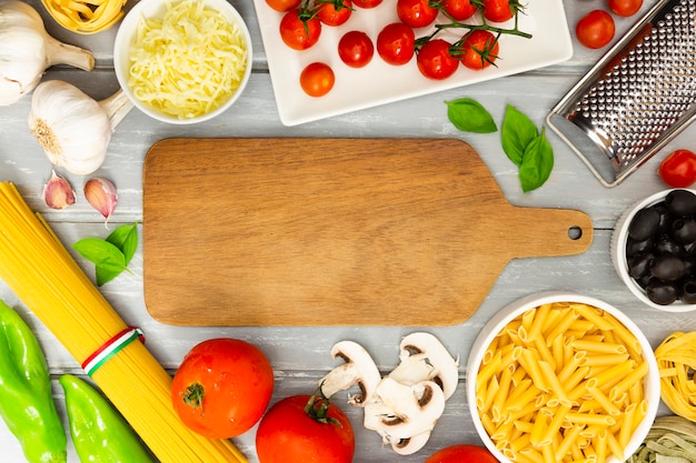 Free photo chopping board with food frame