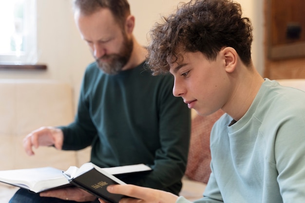 Christian family praying together