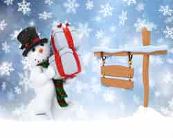 Бесплатное фото Новогодний фон снеговика, несущего подарки со снежным знаком