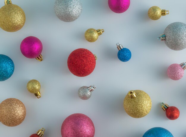 Christmas background pattern made of colorful christmas baubles happy new year wallpaper flat lay