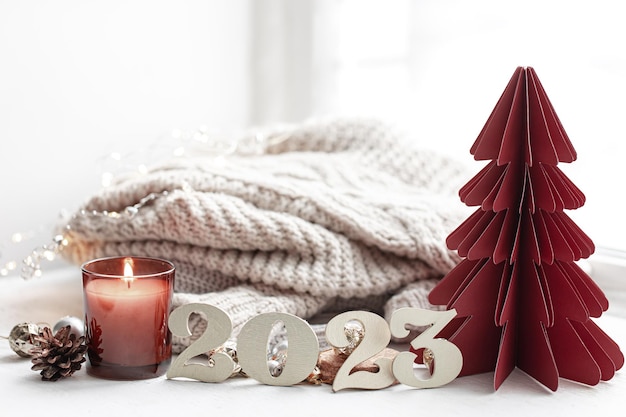 Free photo christmas background with decorative numbers 2023 and cozy details