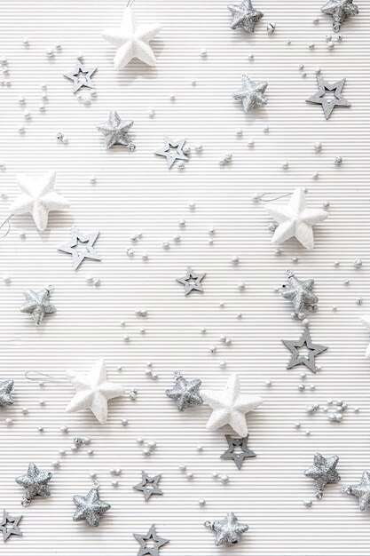Christmas background with decorative stars flat lay