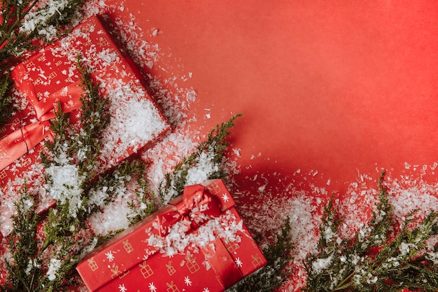 Christmas background with gifts and snow