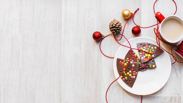 Christmas background with gingerbread on plate