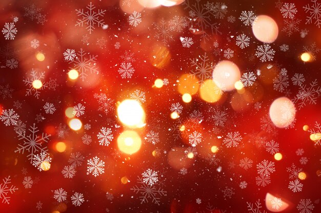 雪とbokehのライトとクリスマスの背景