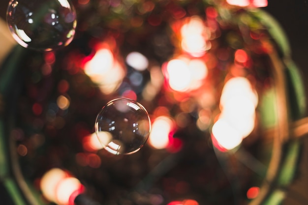 Christmas background with soap bubbles