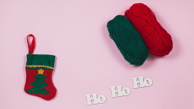 Christmas background with sock and wool