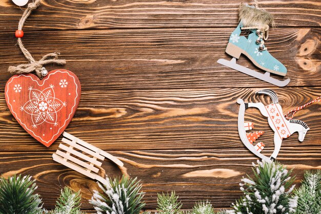 Christmas background with winter elements on wooden texture