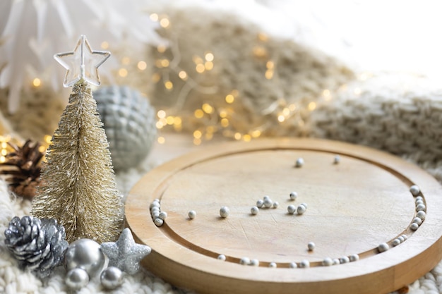 Free photo christmas background with wooden element and silver and gold decorative details