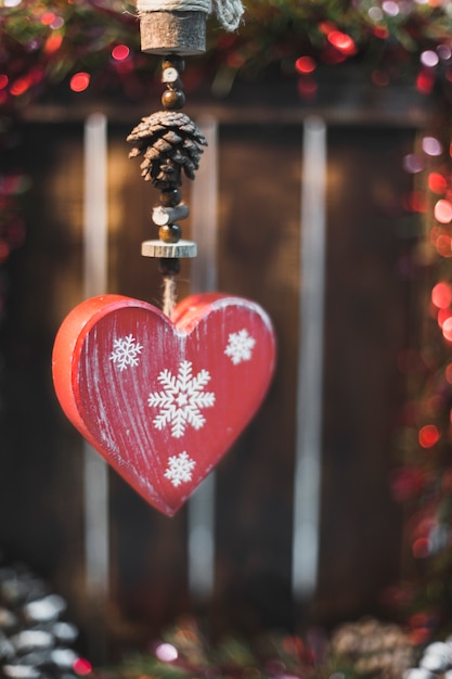 Christmas background with wooden heart