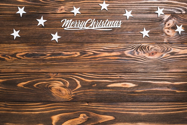 木製の表面を持つクリスマスの背景