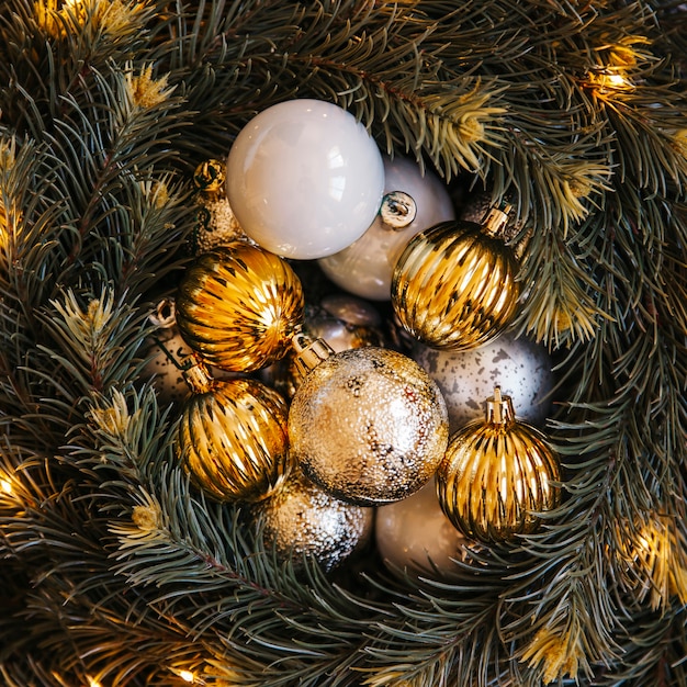 Christmas balls composition with fir branches