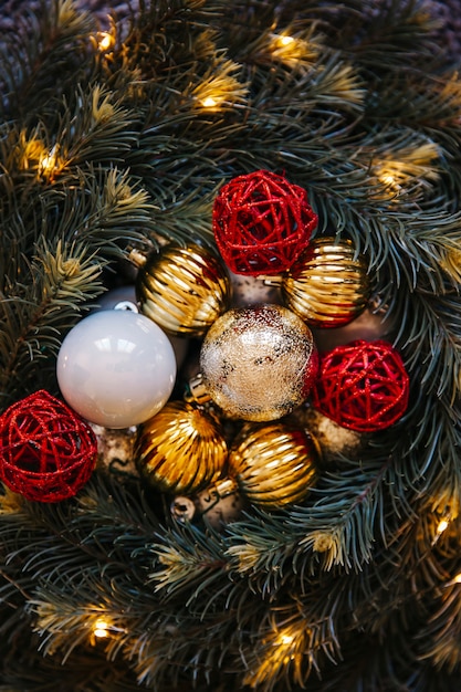 Christmas balls composition with fir branches