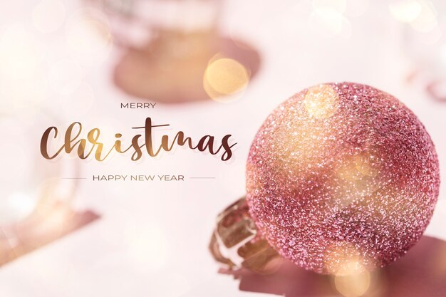 Christmas balls with bokeh lights with Christmas greeting message