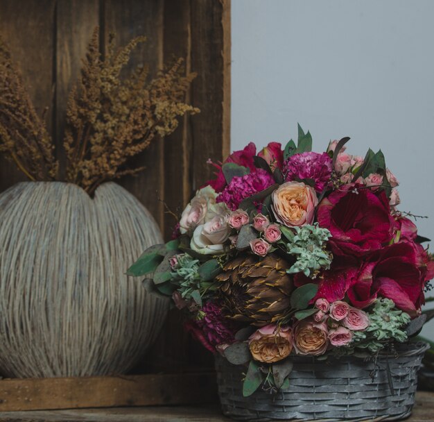 Christmas bouquet and wheat plant in baskets