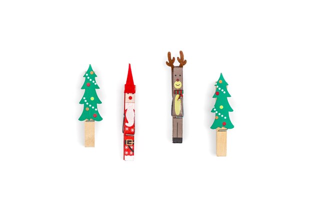 Christmas clothespins on white background isolated flat lay