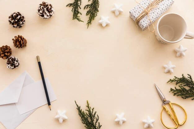 Christmas composition of green branches with cones 