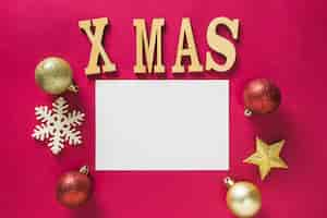 Free photo christmas composition with blank paper