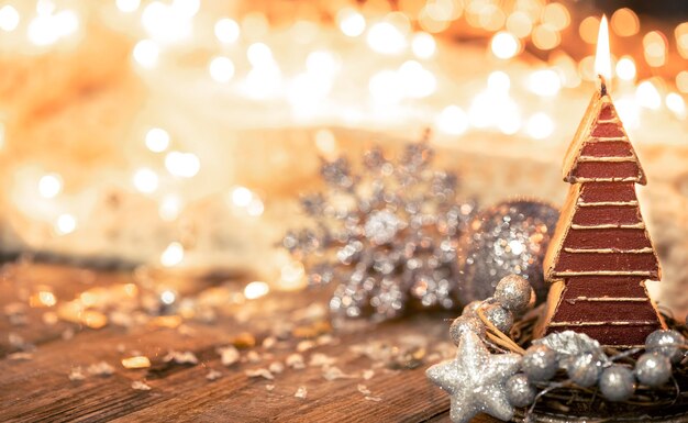 Christmas composition with a candletree and details of a festive decor