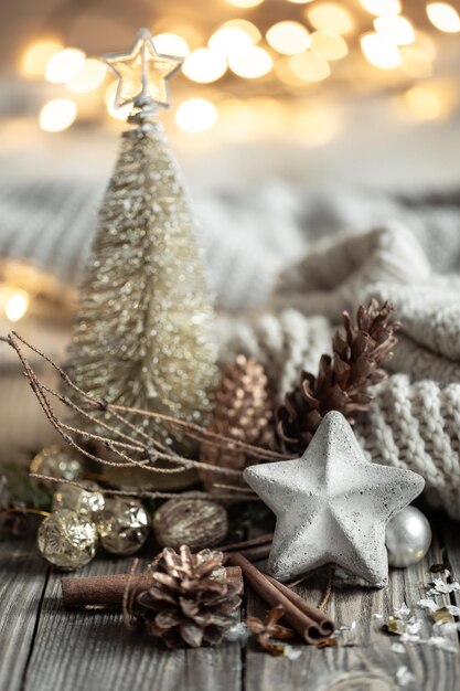 Christmas composition with decor details on blurred background with bokeh