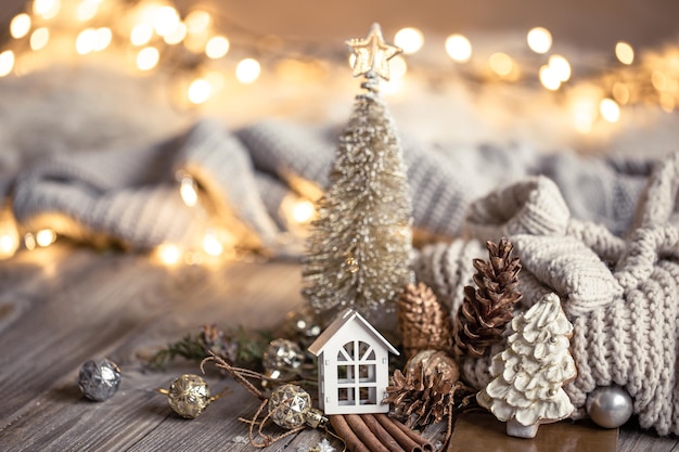 Christmas composition with decor details on blurred background with bokeh