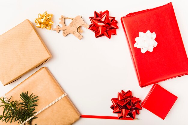 Christmas composition with wrapped boxes and colorful bows 