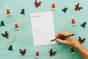 Free photo christmas concept with hand writing