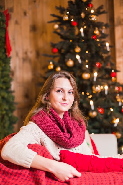 Christmas concept with woman in living room