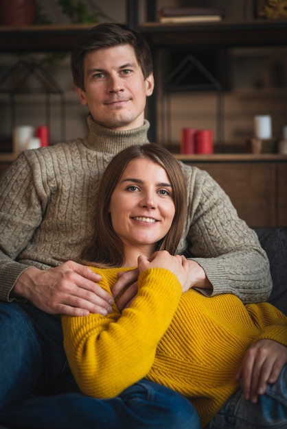 Christmas couple wearing sweaters