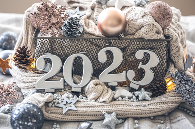 Christmas cozy background with numbers 2023 and decor details