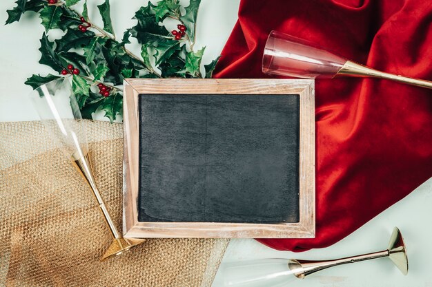 Christmas decoration with slate and champagne glasses