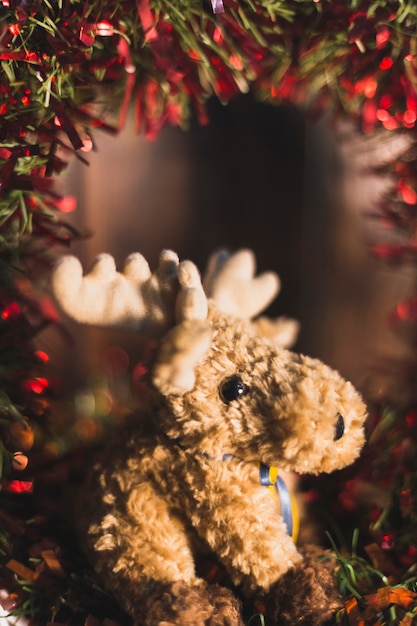 Free photo christmas decoration with small reindeer