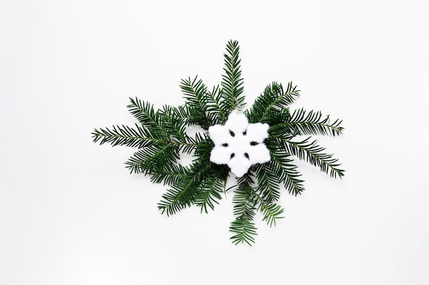 Free photo christmas decoration with snowflake flat lay