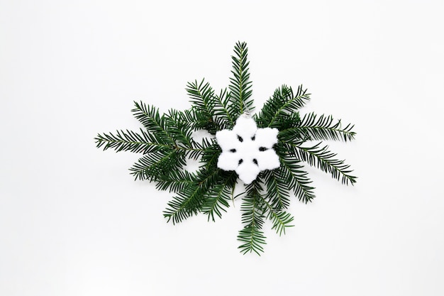 Christmas decoration with snowflake flat lay
