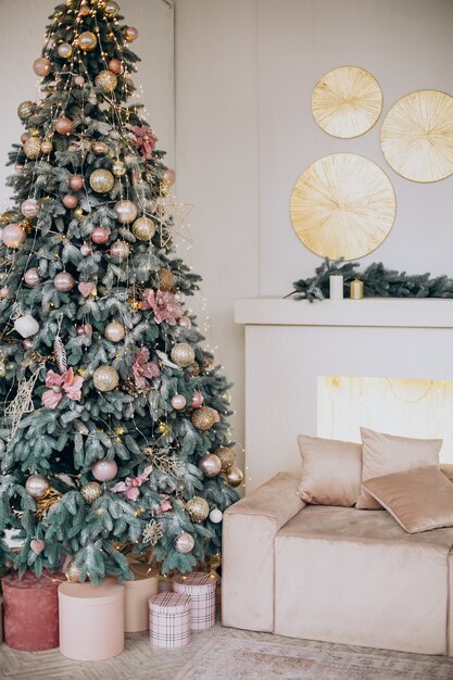 Christmas decorations and christmas tree in room