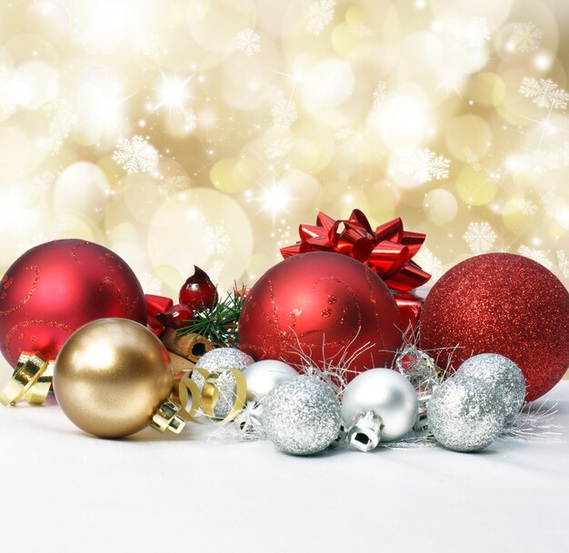 Christmas decorations on a gold with bokeh lights and stars