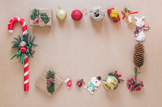 Christmas decorations and present boxes on grey board