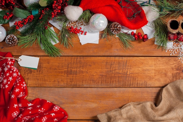 Christmas decorations on wooden table background with copyspace