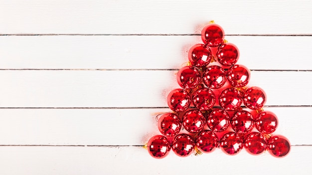 Christmas decorative baubles on white board