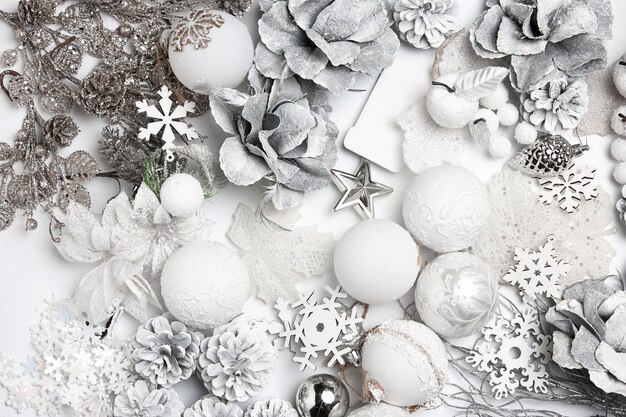 Christmas decorative composition of toys on a white table background.