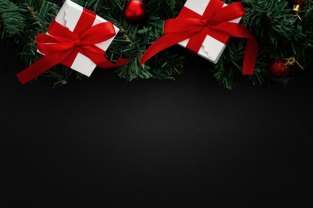 Christmas elements on black wooden background