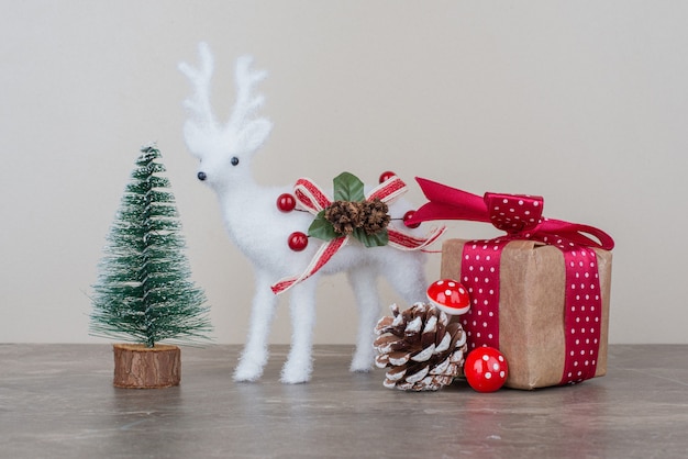 Christmas festive decorations on marble surface.