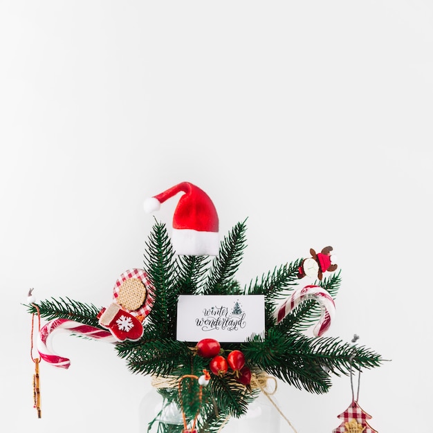 Christmas fir branch decorated with colorful ornaments