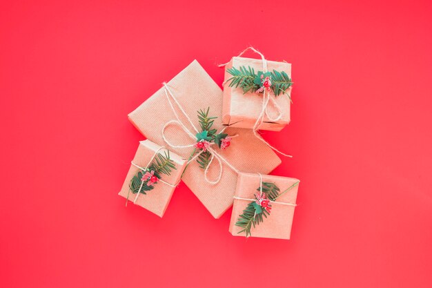 Christmas gift boxes on red table