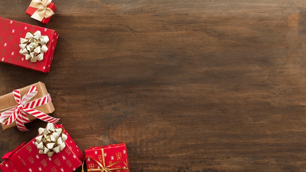 Christmas gift boxes with bows on table 